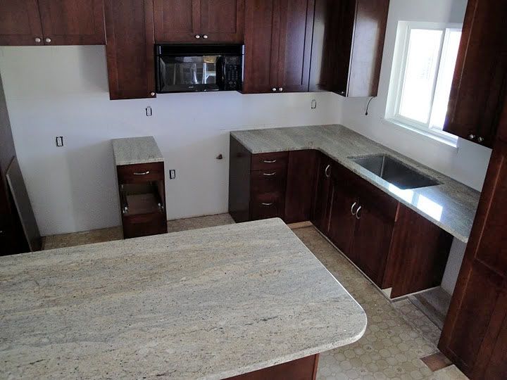 Underneath the floating end of the granite, we installed an L bracket ...